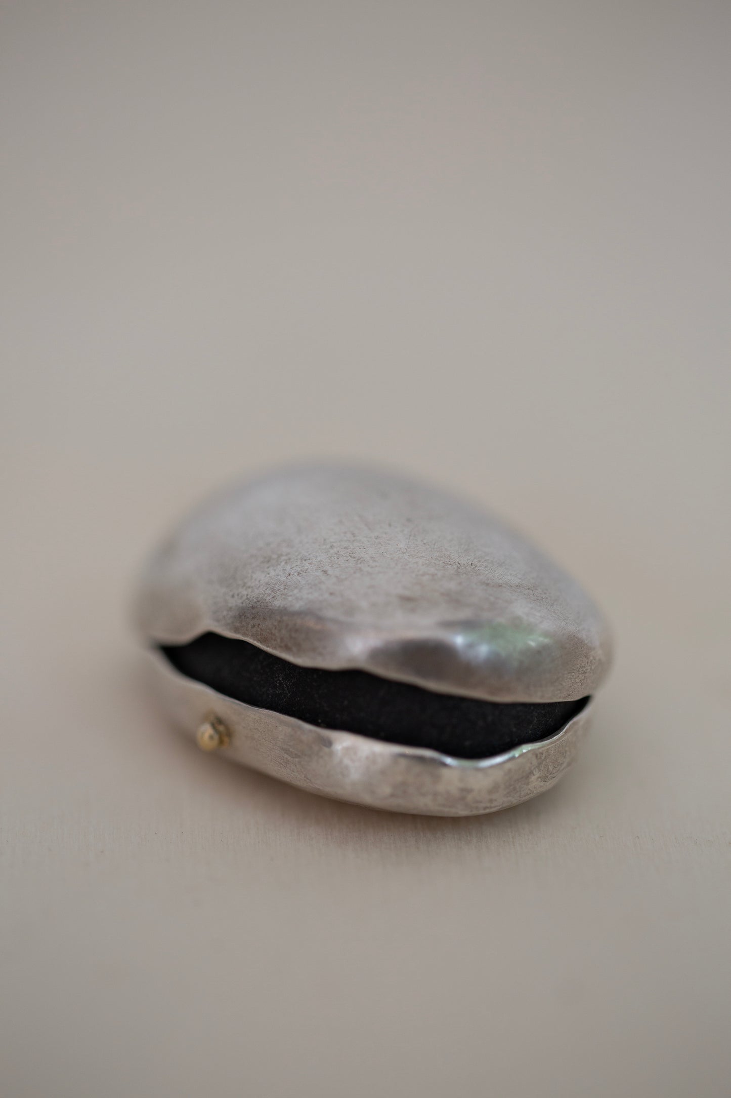 Pure sterling silver stone vessel by Mayumi Utsunomiya
