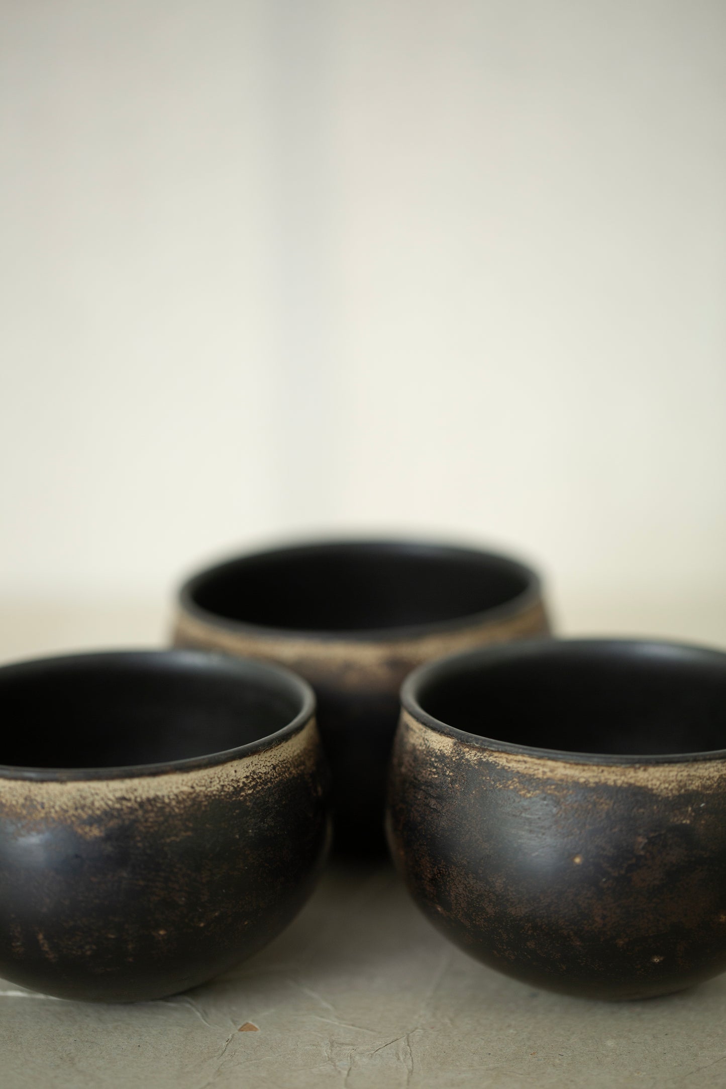 Small ceramic cups by Kenta Anzai
