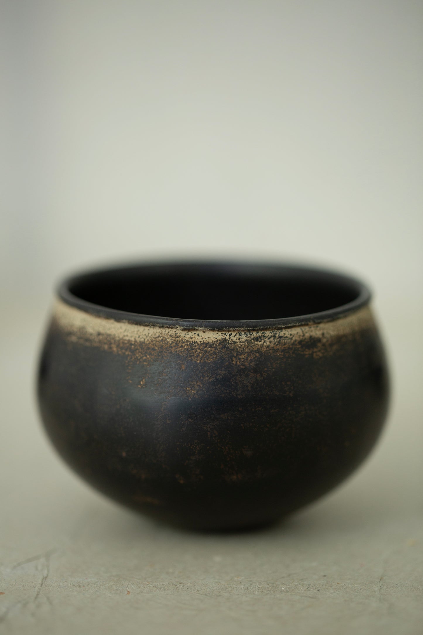 Small ceramic cups by Kenta Anzai