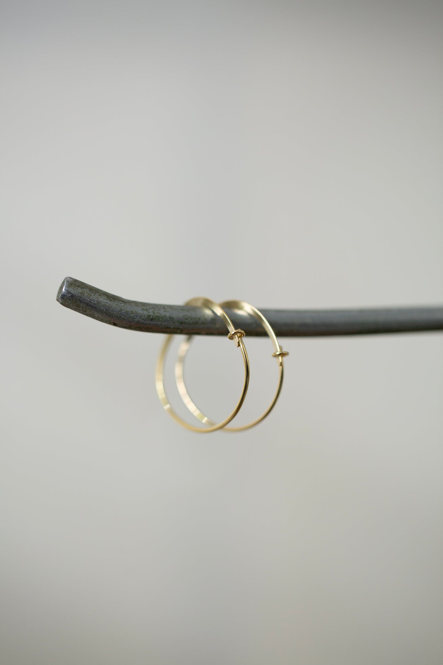 Pair Of Gold Hand Forged Earrings