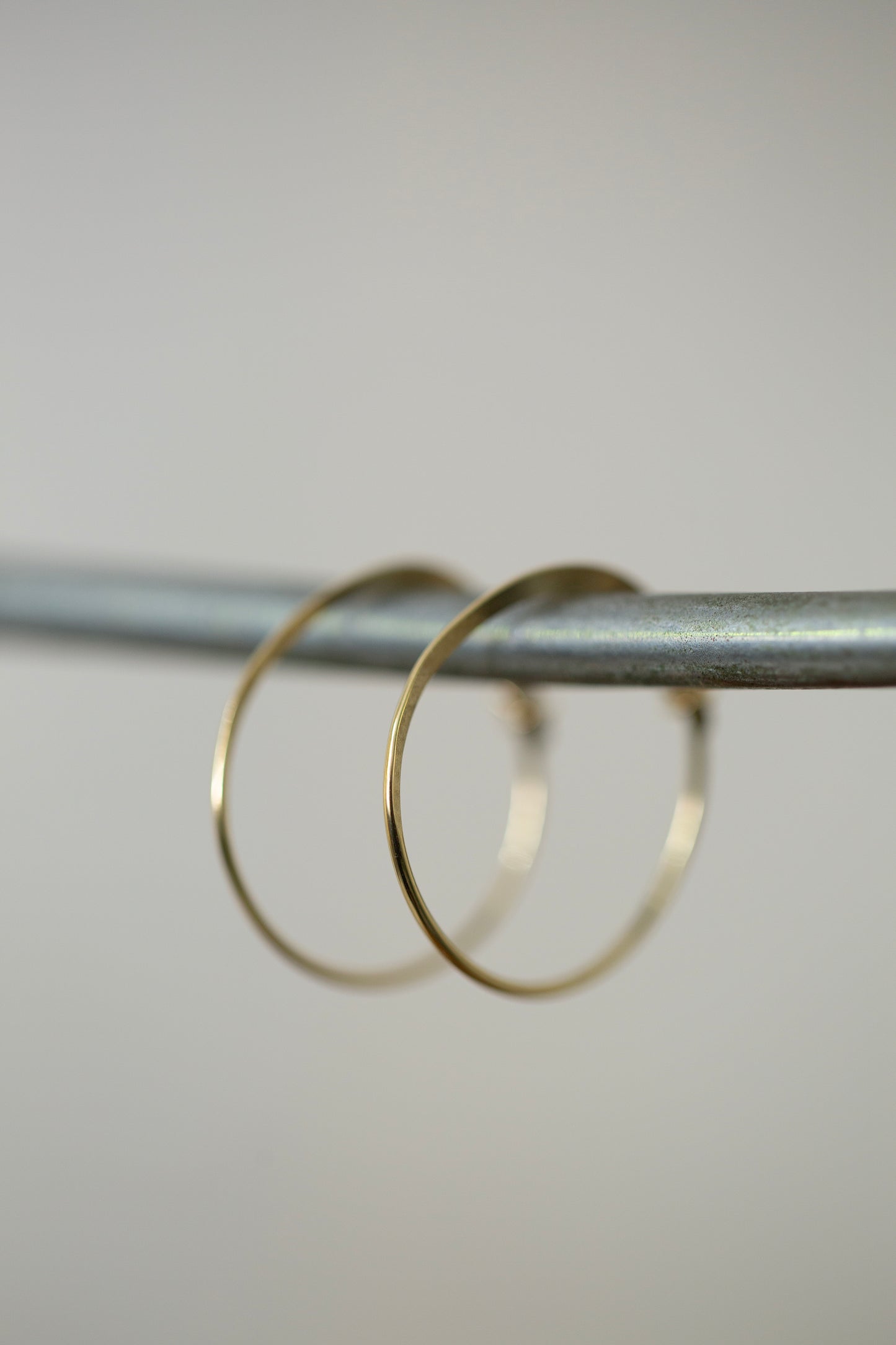 Pair Of Gold Hand Forged Earrings