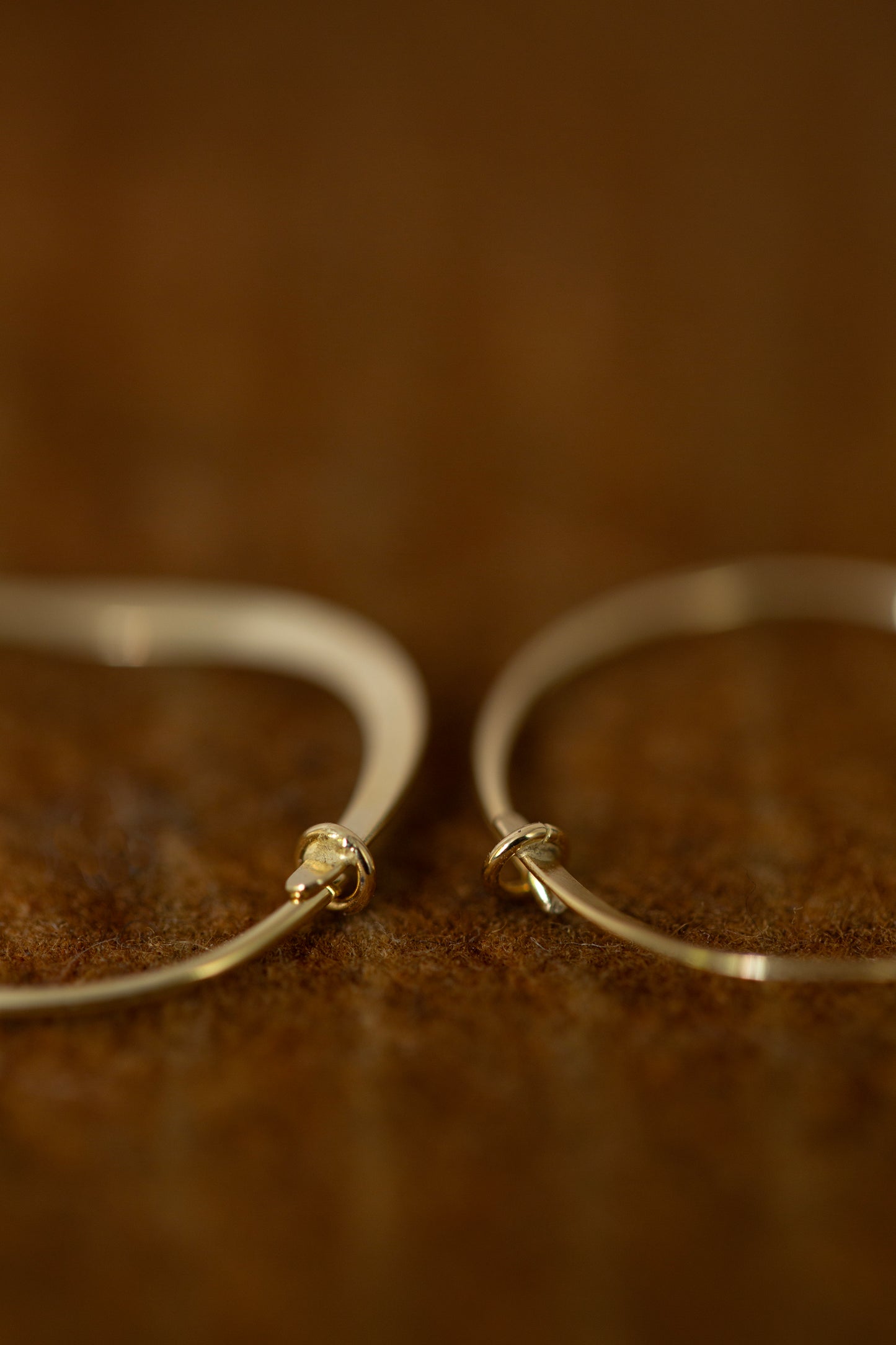 Pair Of Gold Hand Forged Earrings