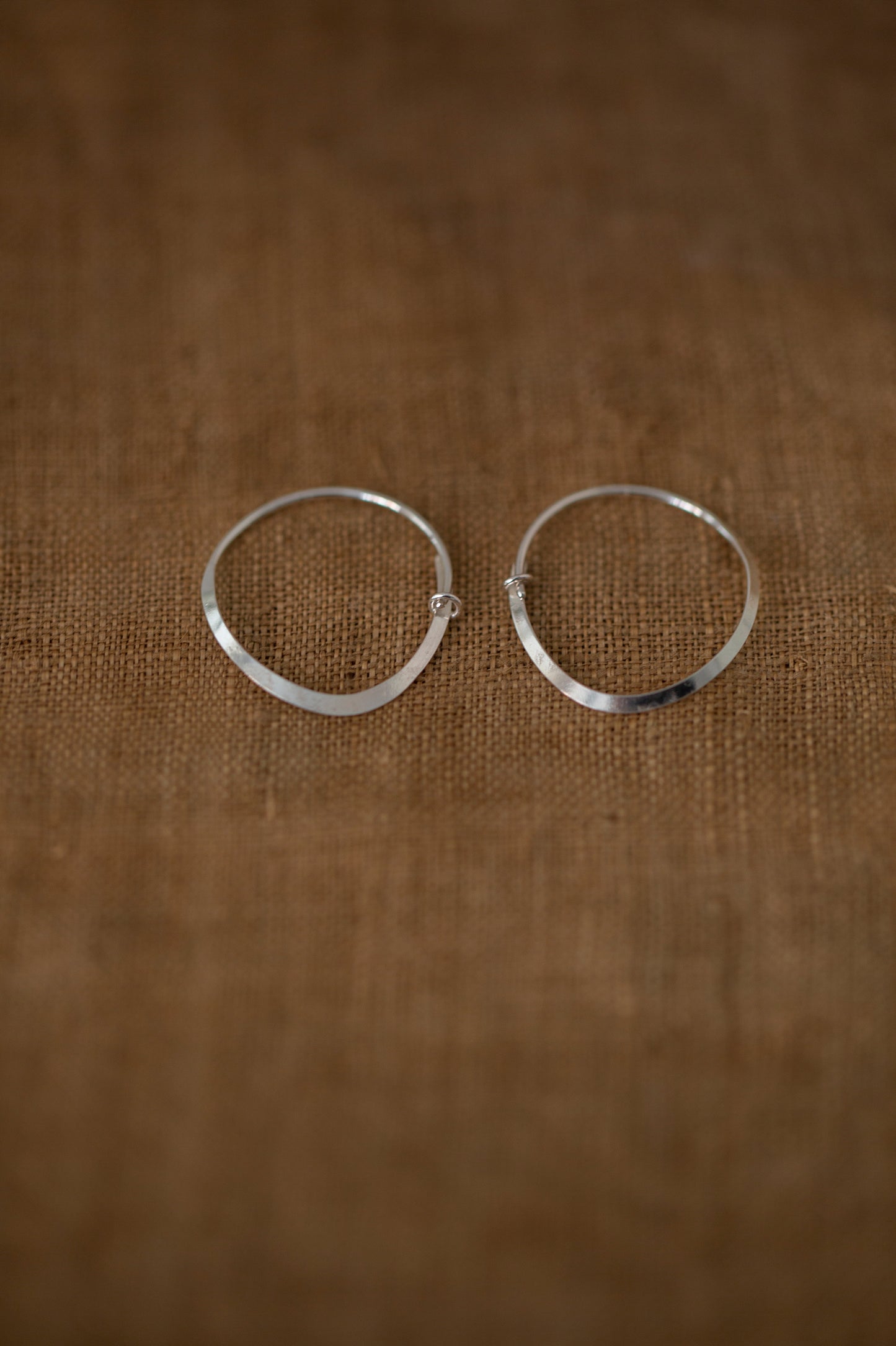Pair Of Silver Hand Forged Earrings - small