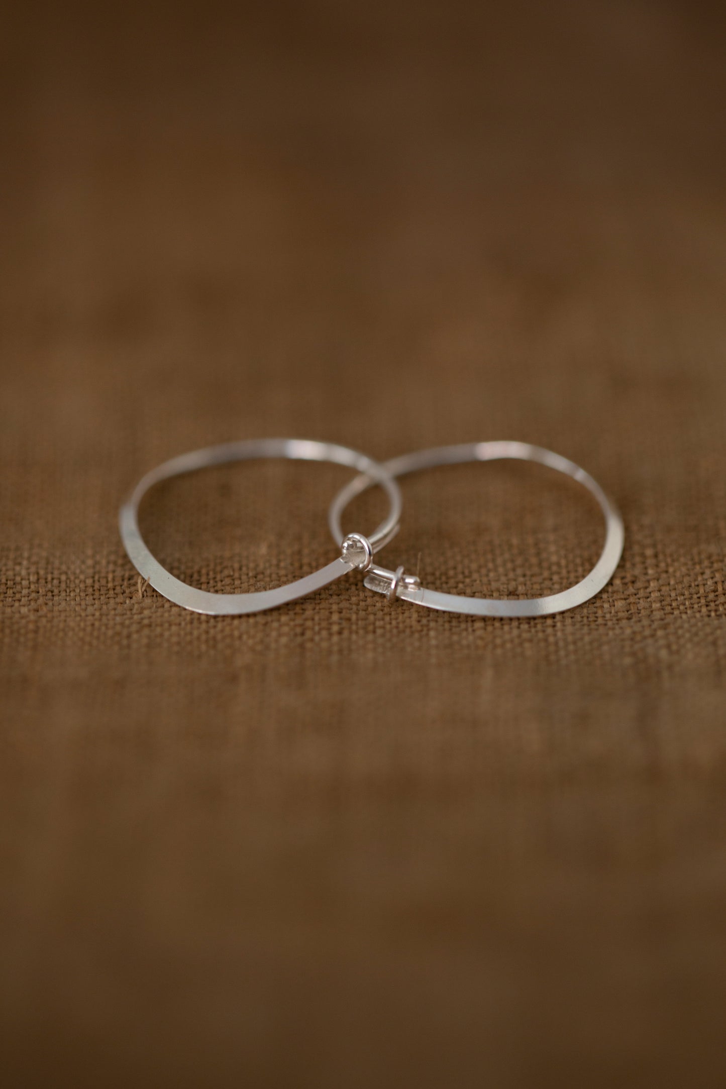 Pair Of Silver Hand Forged Earrings - small