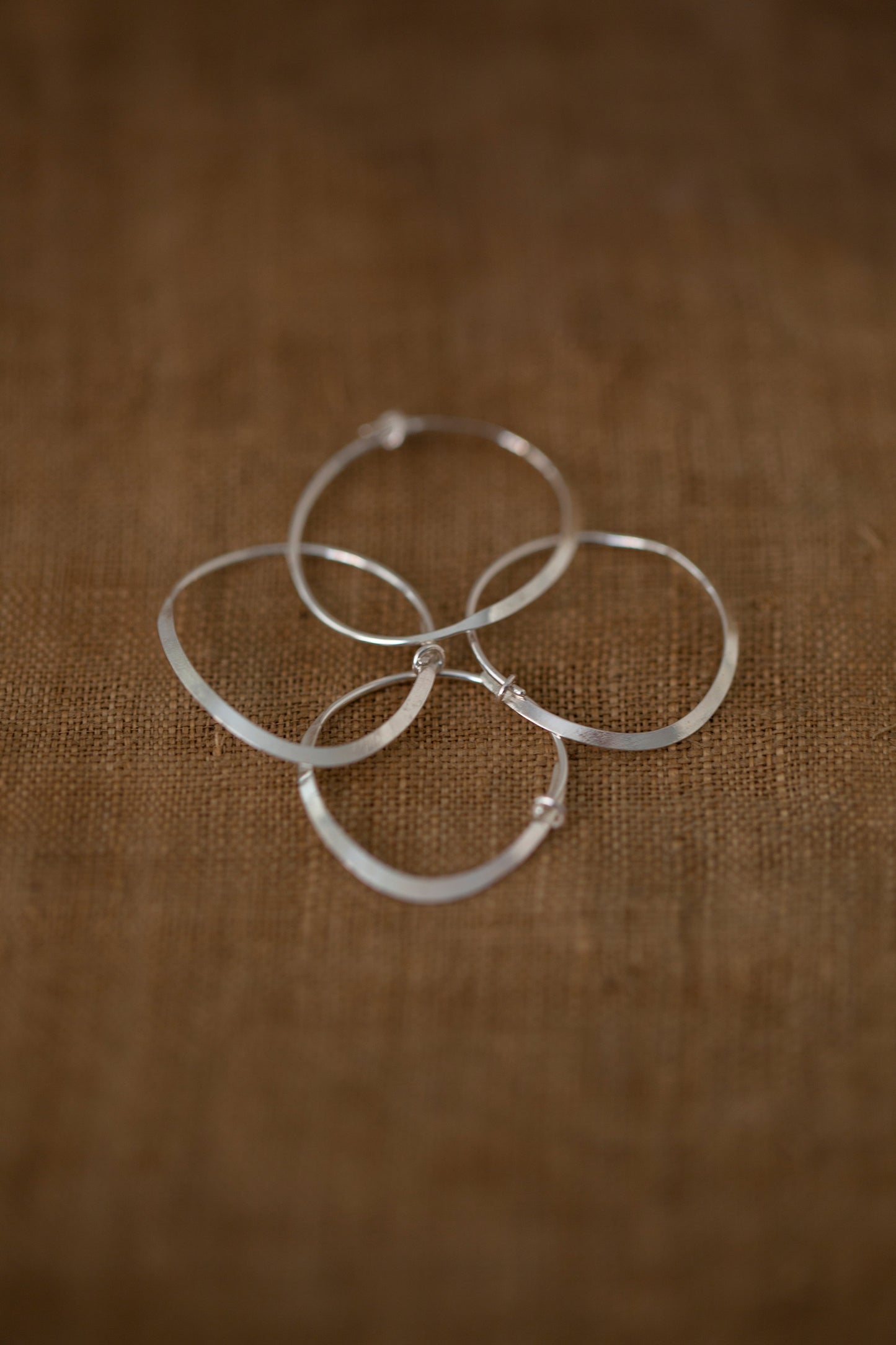 Pair Of Silver Hand Forged Earrings - small