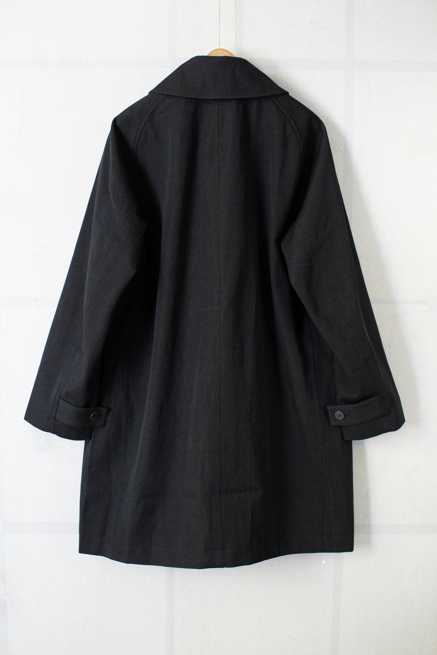 Overcoat in black/green wool-cotton twill