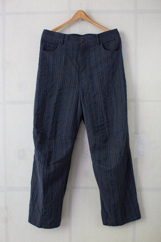Indigo stripe skewed baggy 5 pocket pants