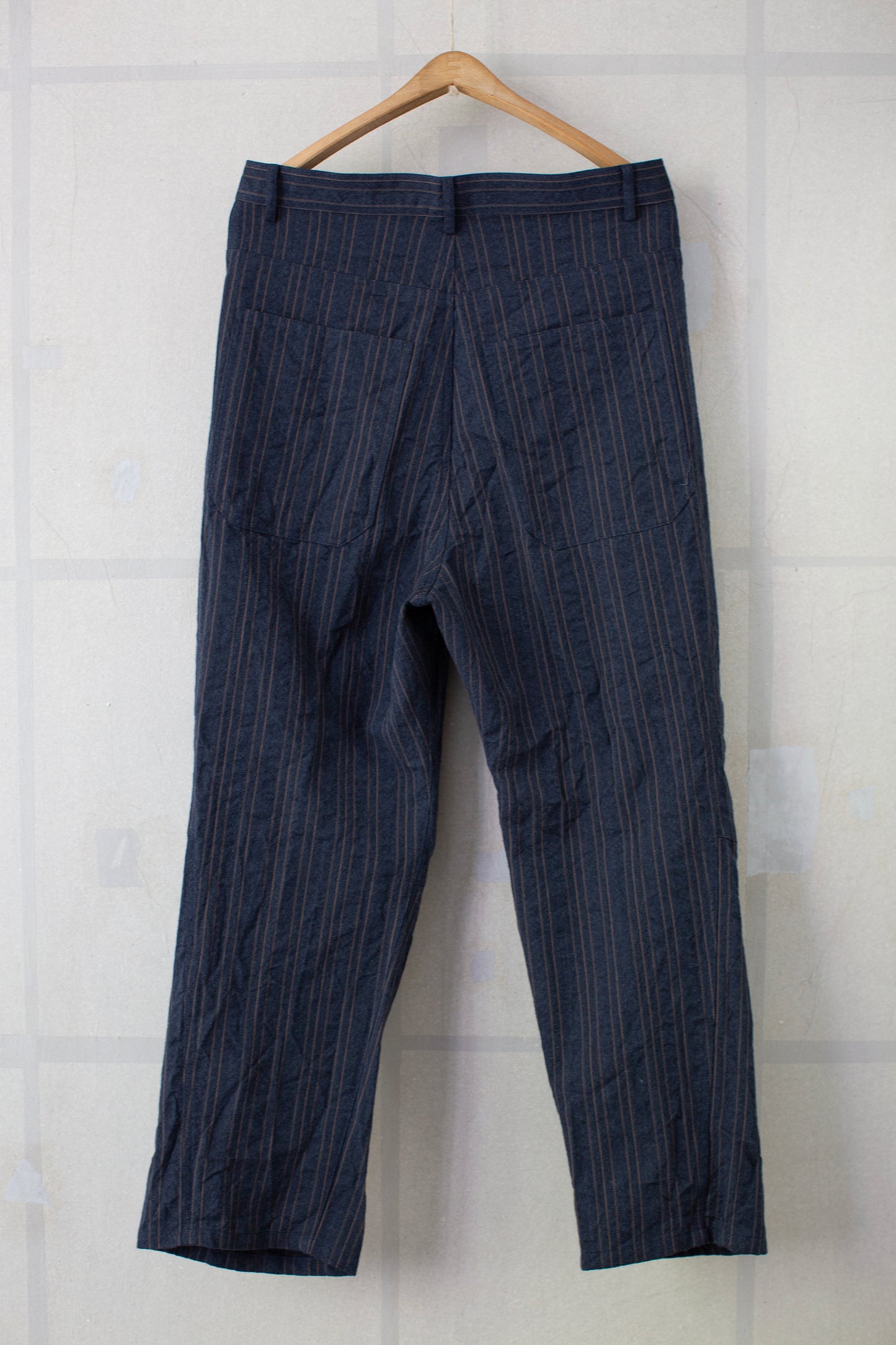 Indigo stripe skewed baggy 5 pocket pants