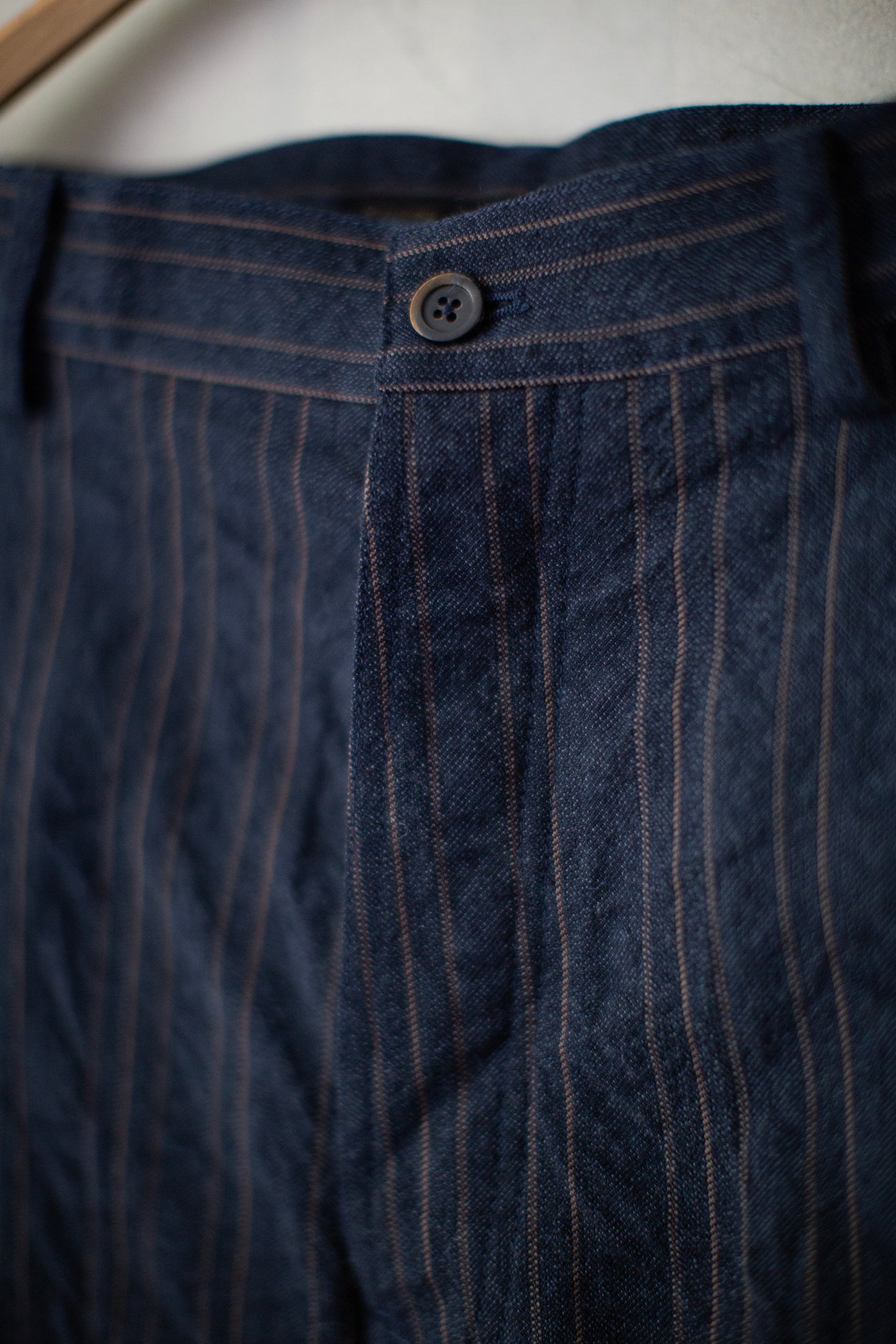 Indigo stripe skewed baggy 5 pocket pants