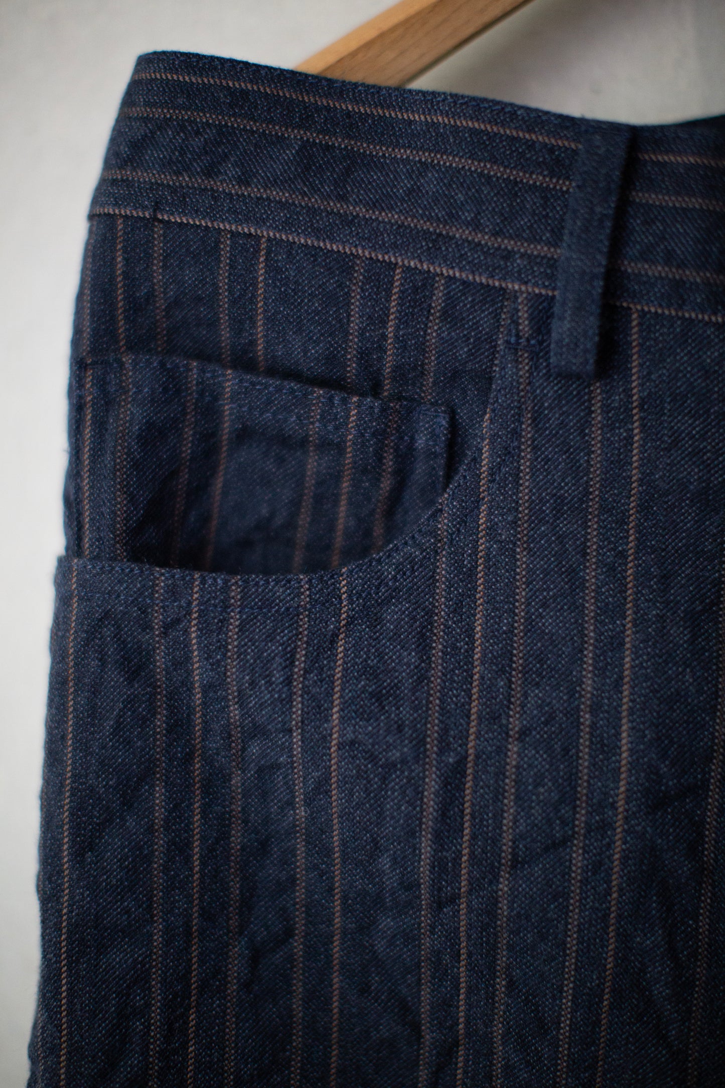 Indigo stripe skewed baggy 5 pocket pants