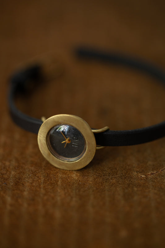 Black/brass 'PETAL' watch