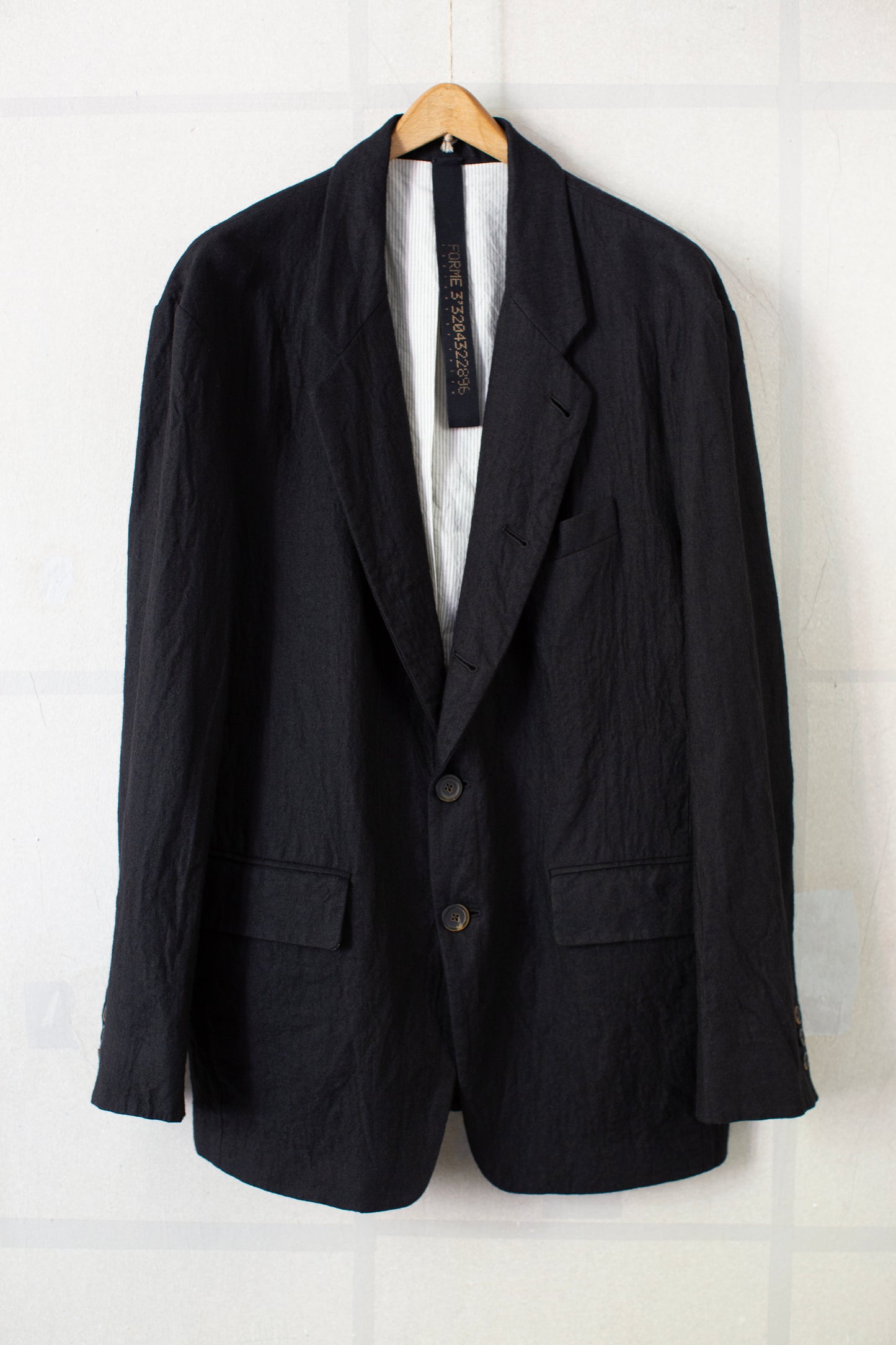Black five-button Relaxed Blazer