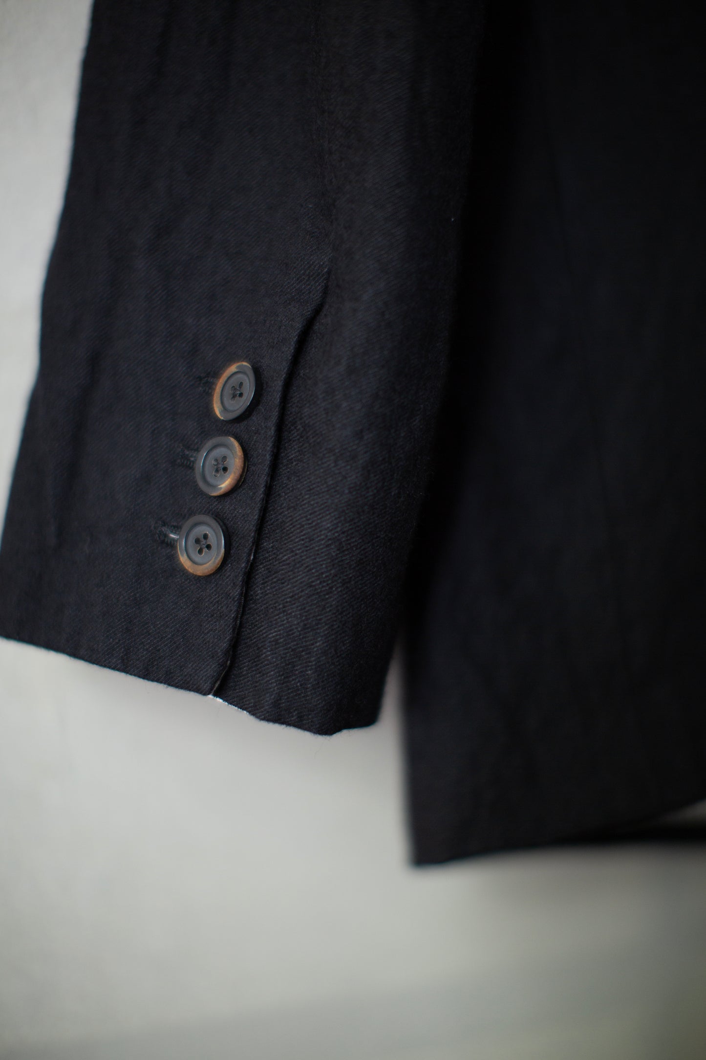 Black five-button Relaxed Blazer