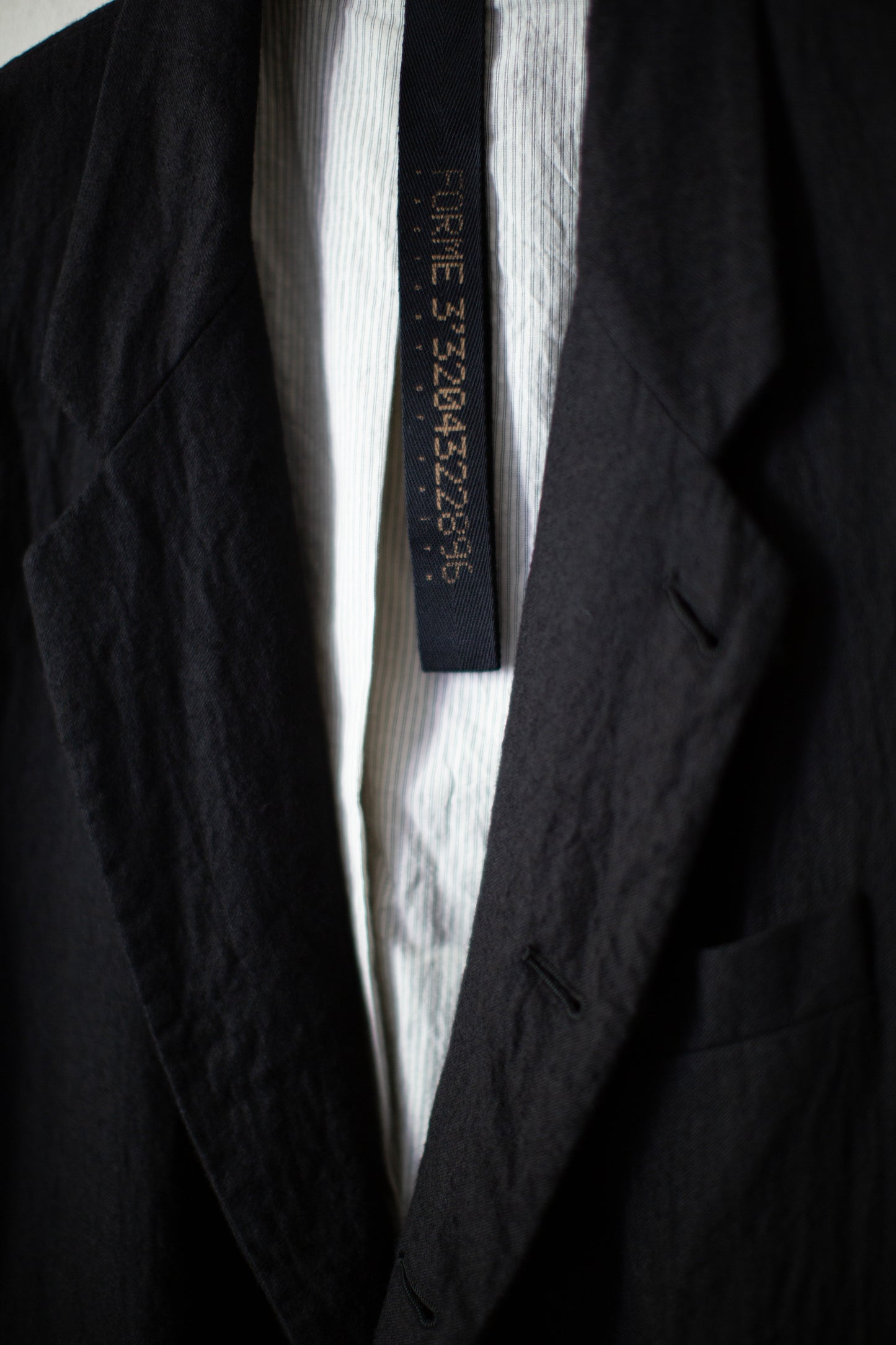 Black five-button Relaxed Blazer
