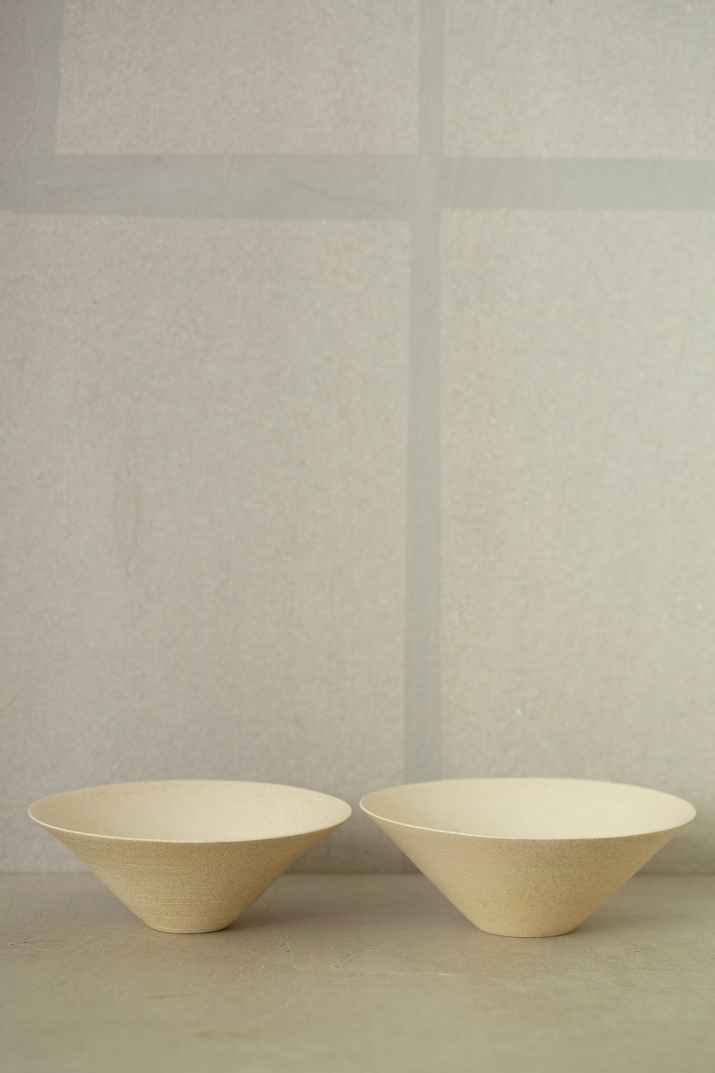 White ceramic bowls by Ciprian Tocu