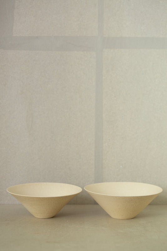 White ceramic bowls by Ciprian Tocu