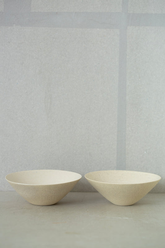 White ceramic bowls by Ciprian Tocu