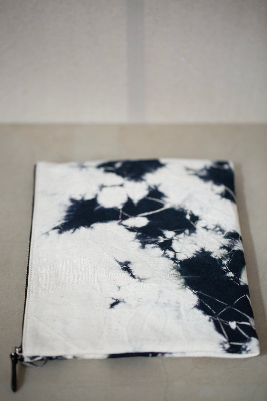 black / ivory organic cotton pouch M with shibori dyed pattern