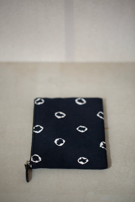 black / ivory organic cotton pouch S with shibori dyed pattern