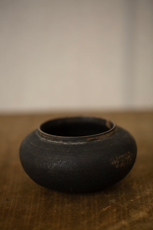 Antique wooden vessel
