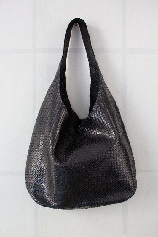 Seamless hand woven black carrier bag in goat leather