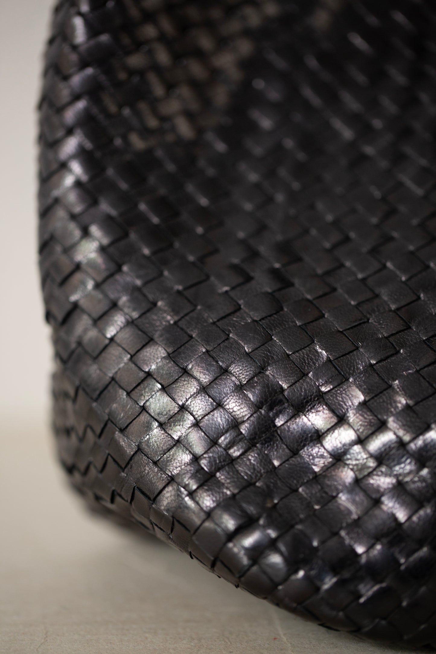 Seamless hand woven black carrier bag in goat leather