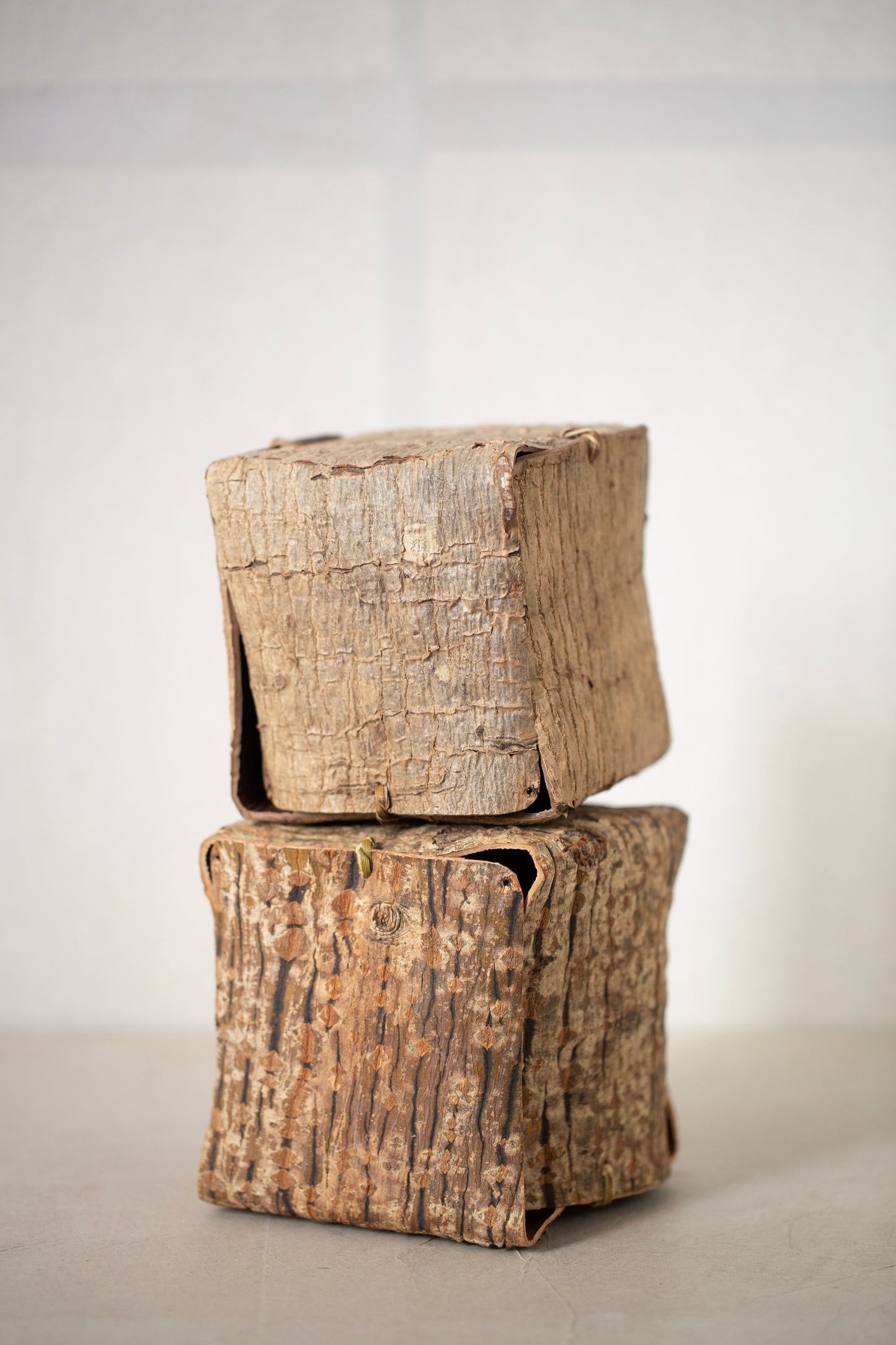 Japanese wallnut bark cube sculpture