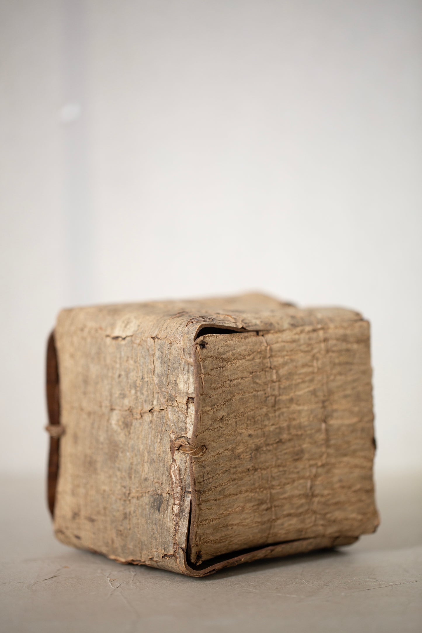 Japanese wallnut bark cube sculpture
