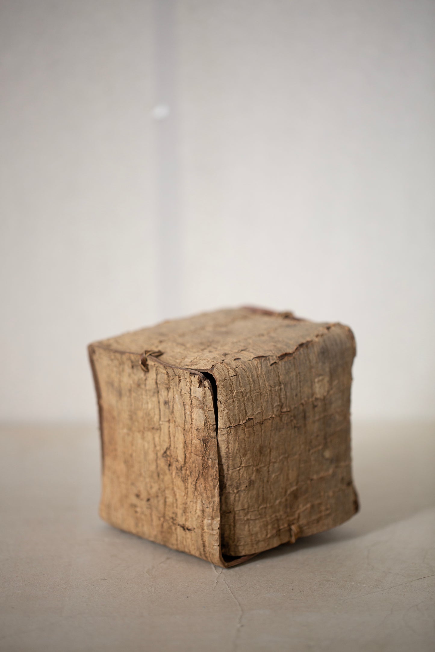 Japanese wallnut bark cube sculpture