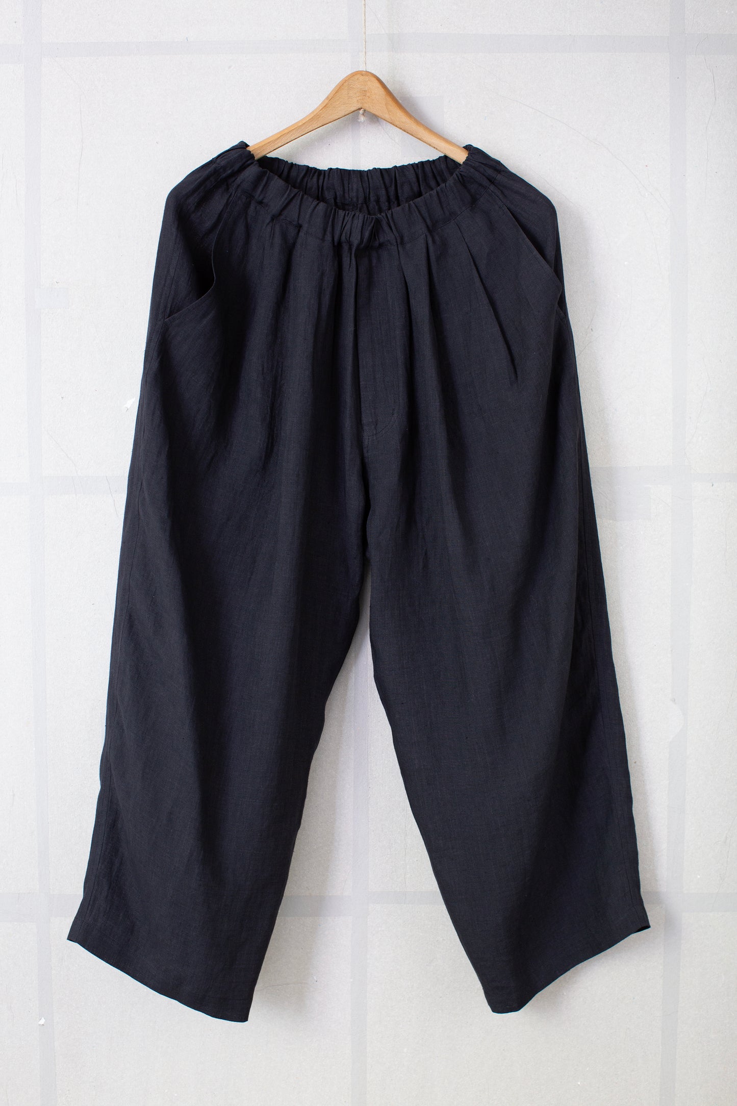 Black unevenly dyed linen trousers