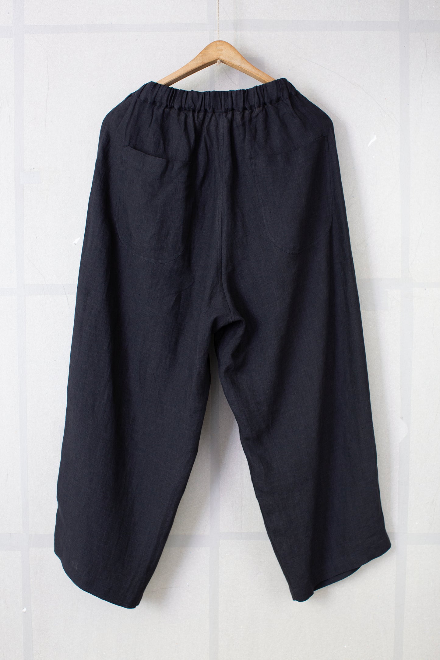 Black unevenly dyed linen trousers