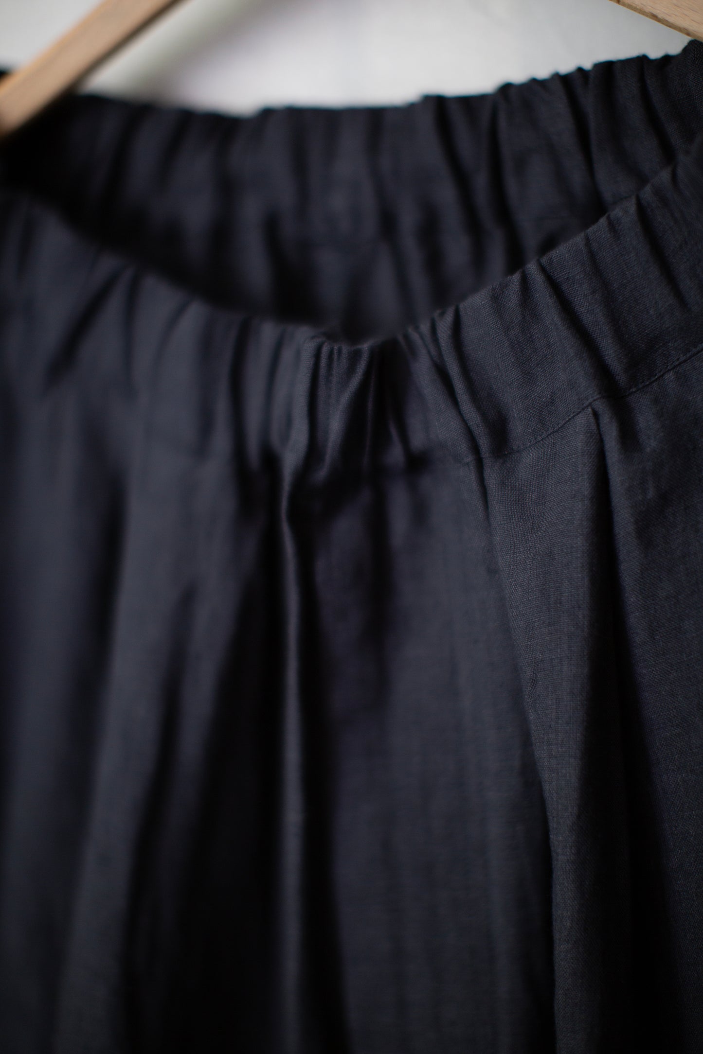 Black unevenly dyed linen trousers