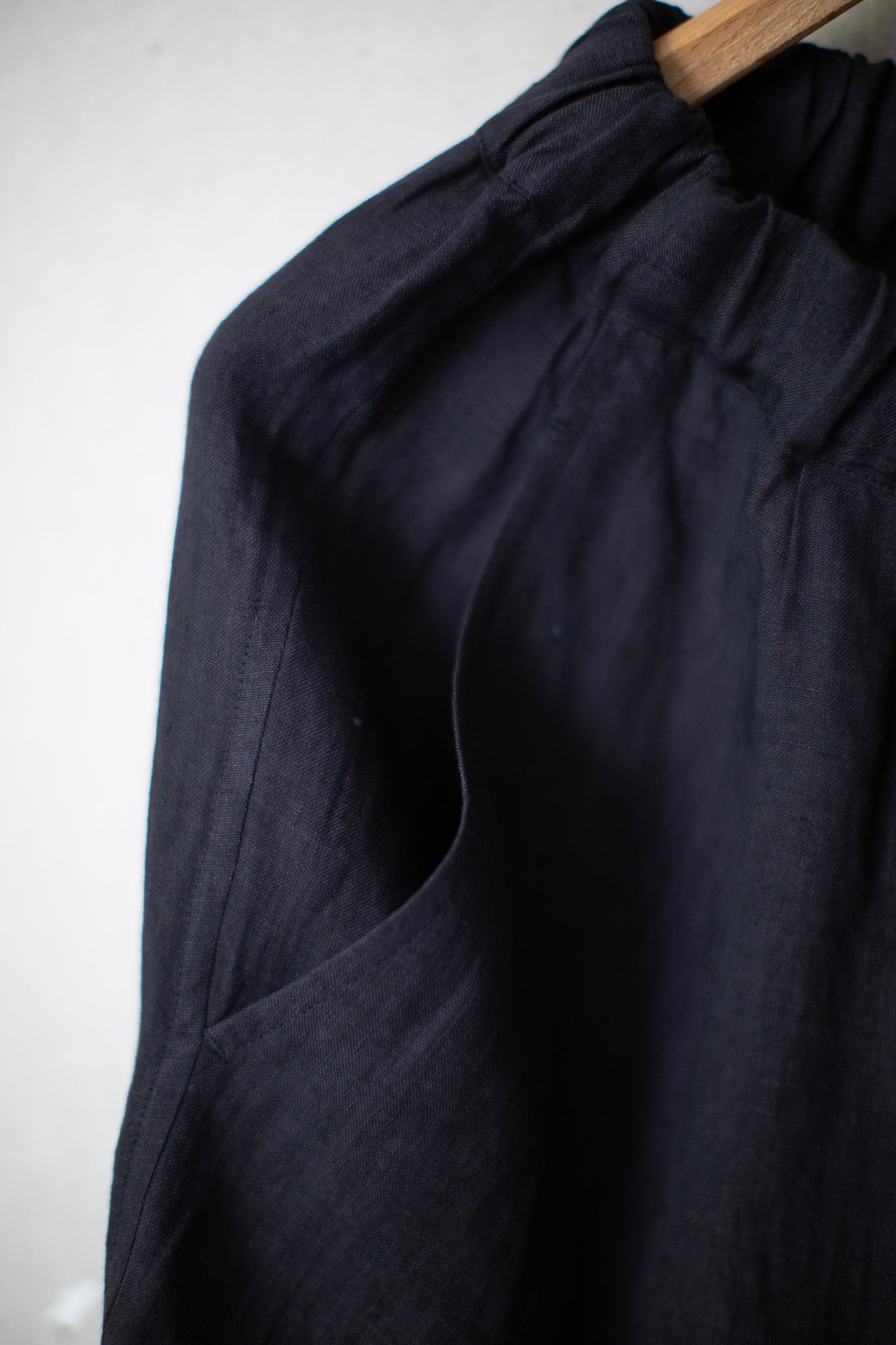 Black unevenly dyed linen trousers