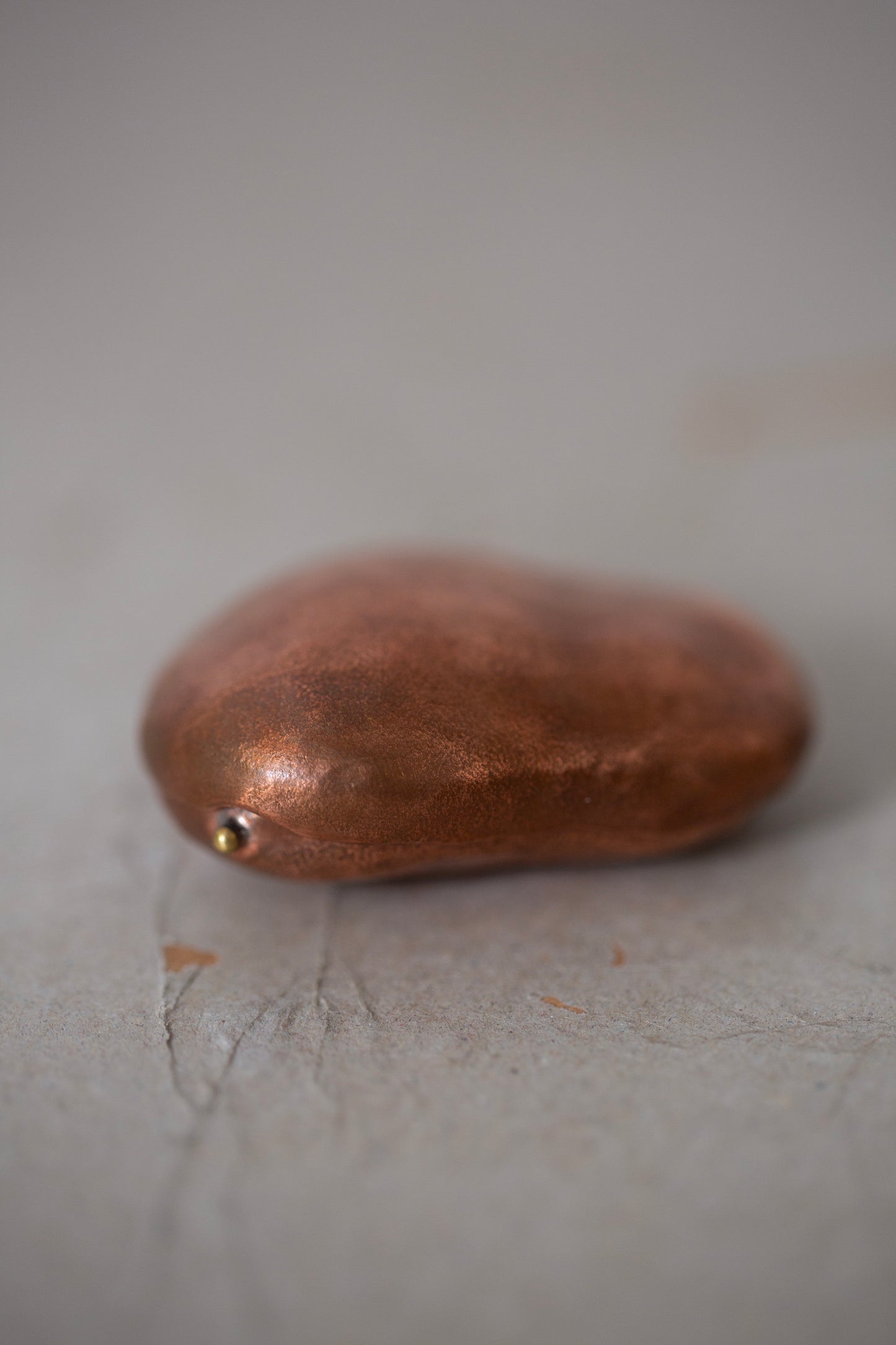 Ishiki stone in a copper vessel