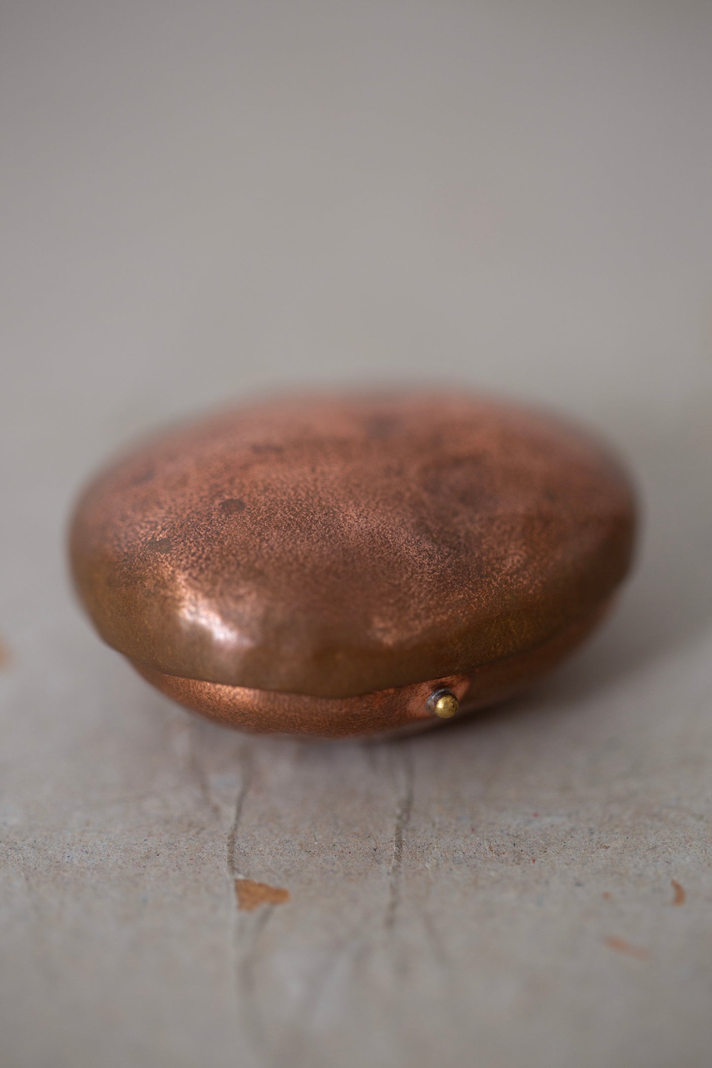 Ishiki stone in a copper vessel