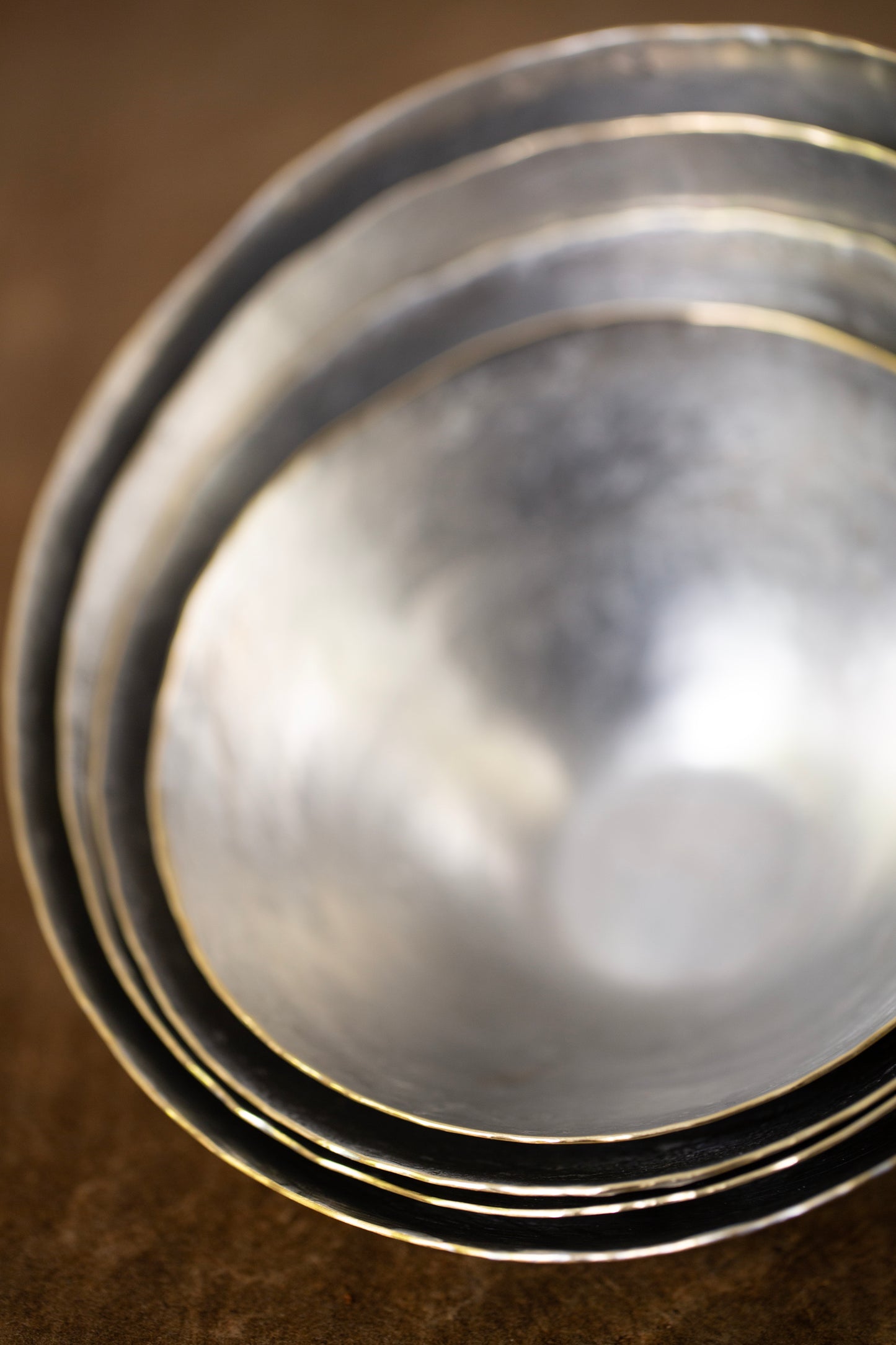 Tin coated bowls by Hiroyo Masuko