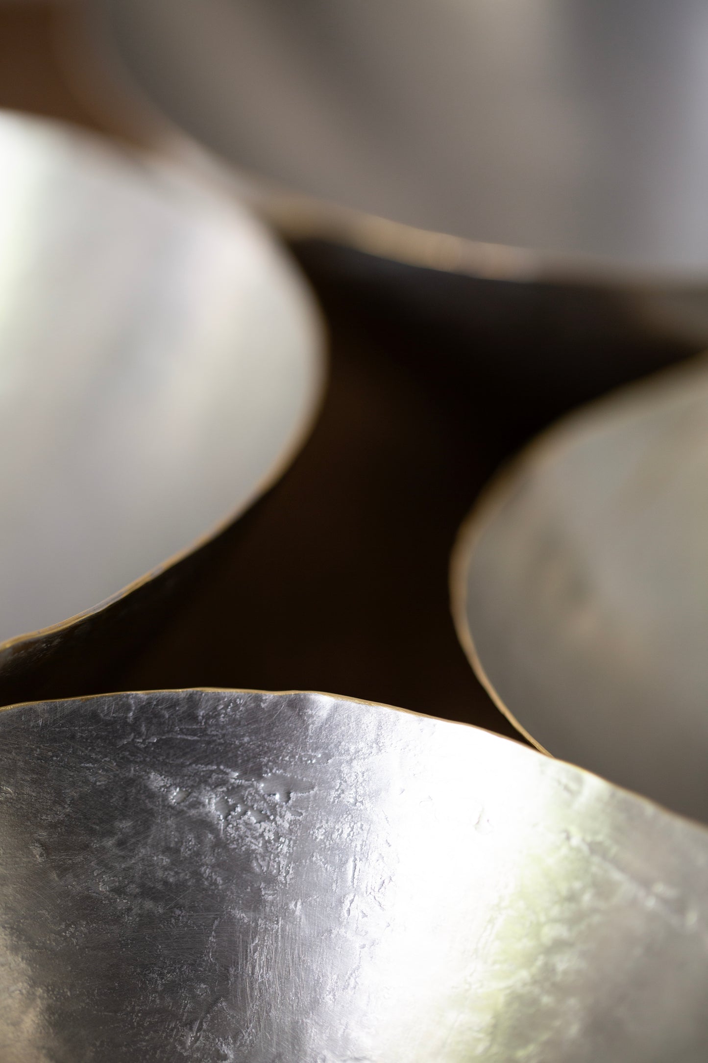 Tin coated bowls by Hiroyo Masuko