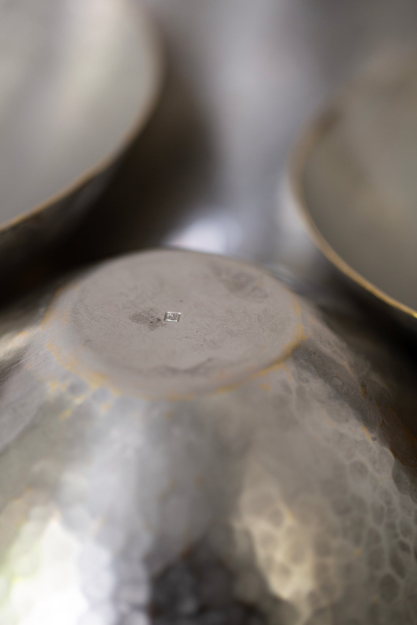 Tin coated bowls by Hiroyo Masuko
