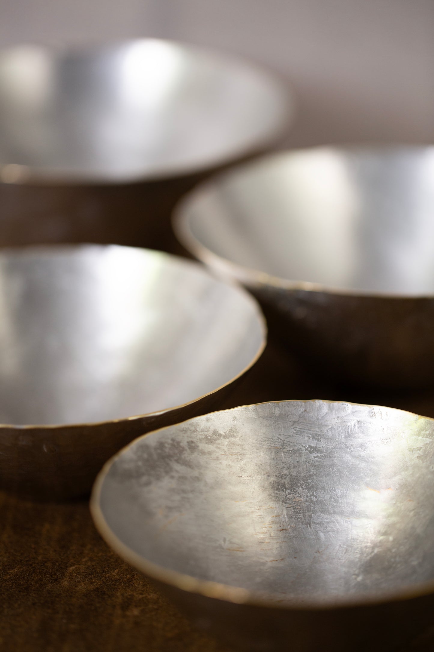 Tin coated bowls by Hiroyo Masuko