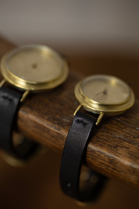 Small brass watch