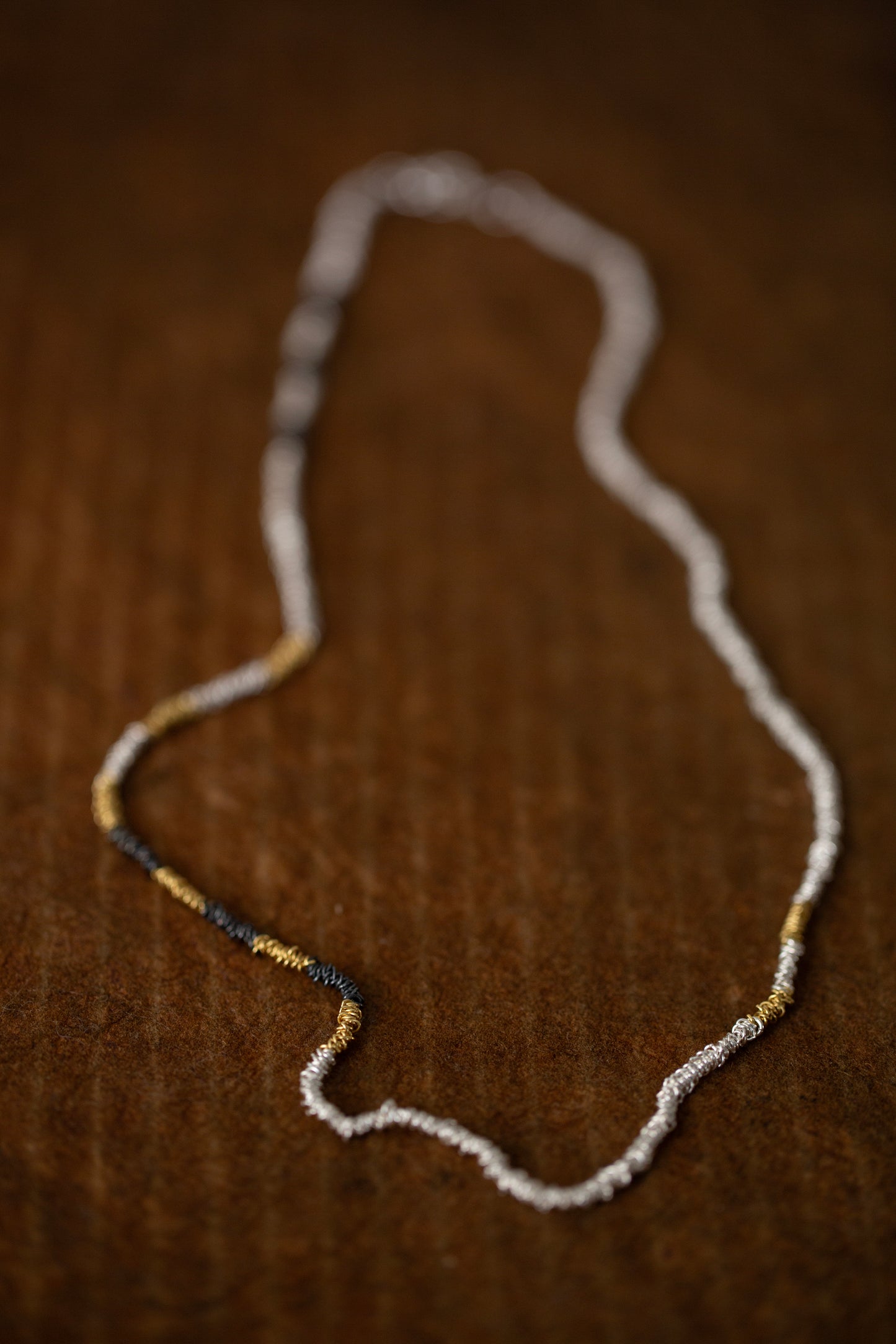 Gathered Necklace in silver, oxidized silver and gold plated silver