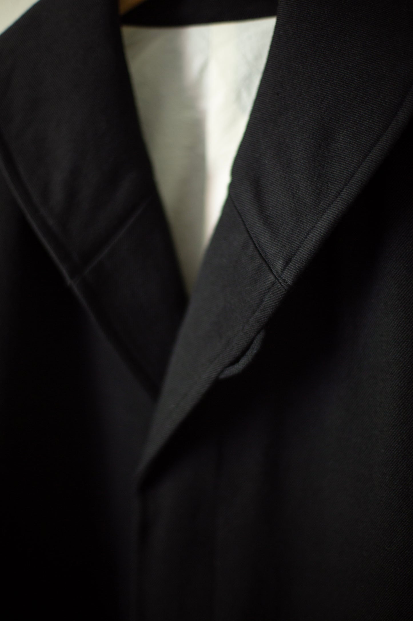 Overcoat in black wool-cotton twill