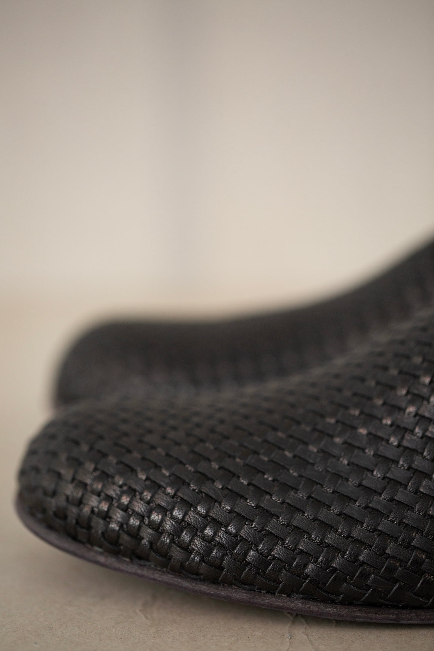 handmade woven cowhide babouche black