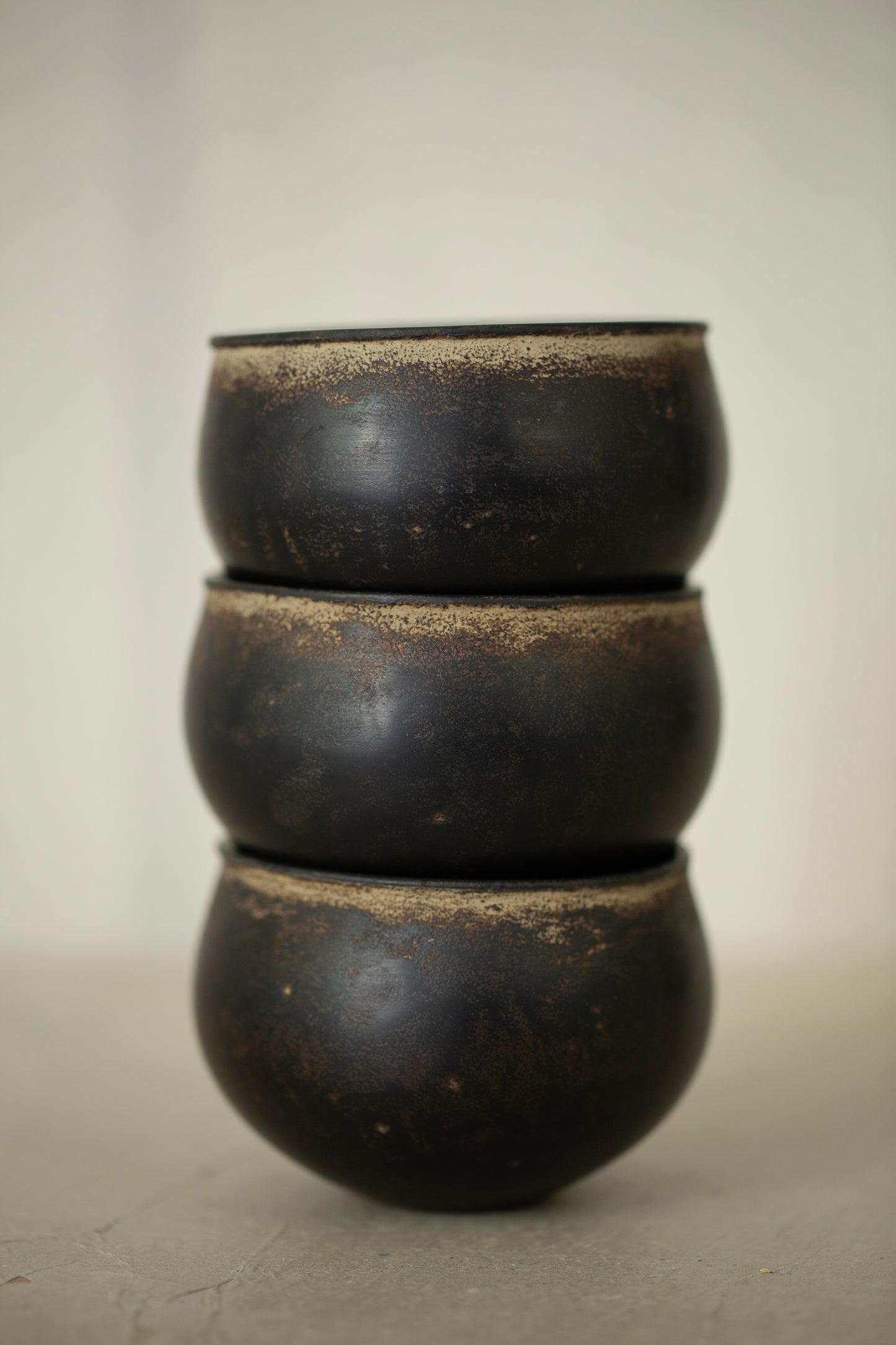 Small ceramic cups by Kenta Anzai