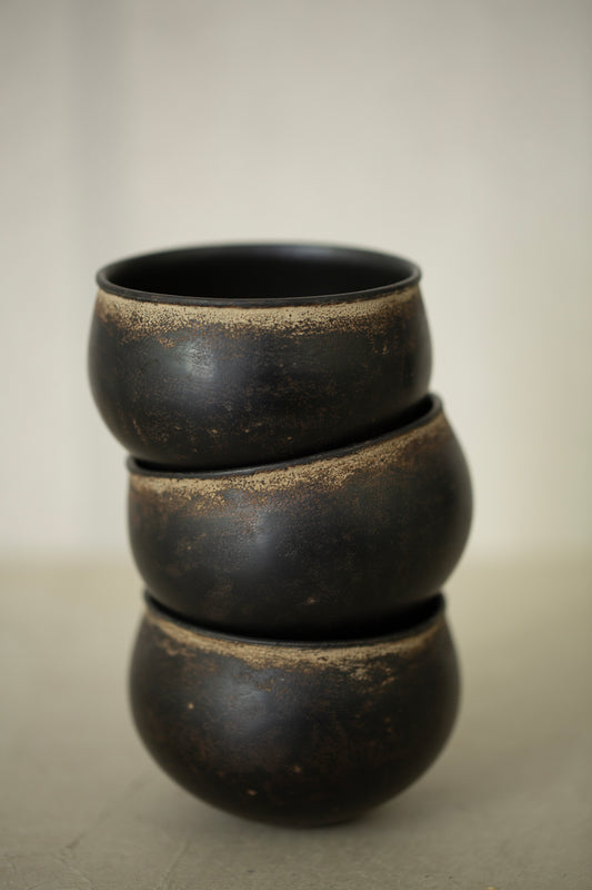 Small ceramic cups by Kenta Anzai