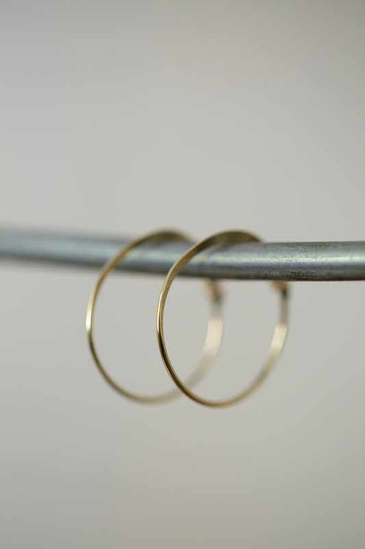 Pair Of Gold Hand Forged Earrings