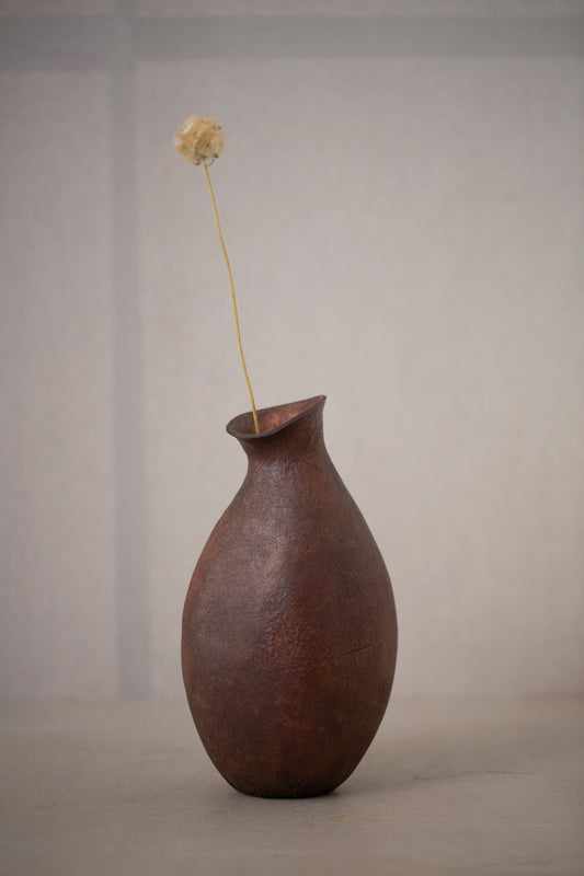 Hand crafted leather vase