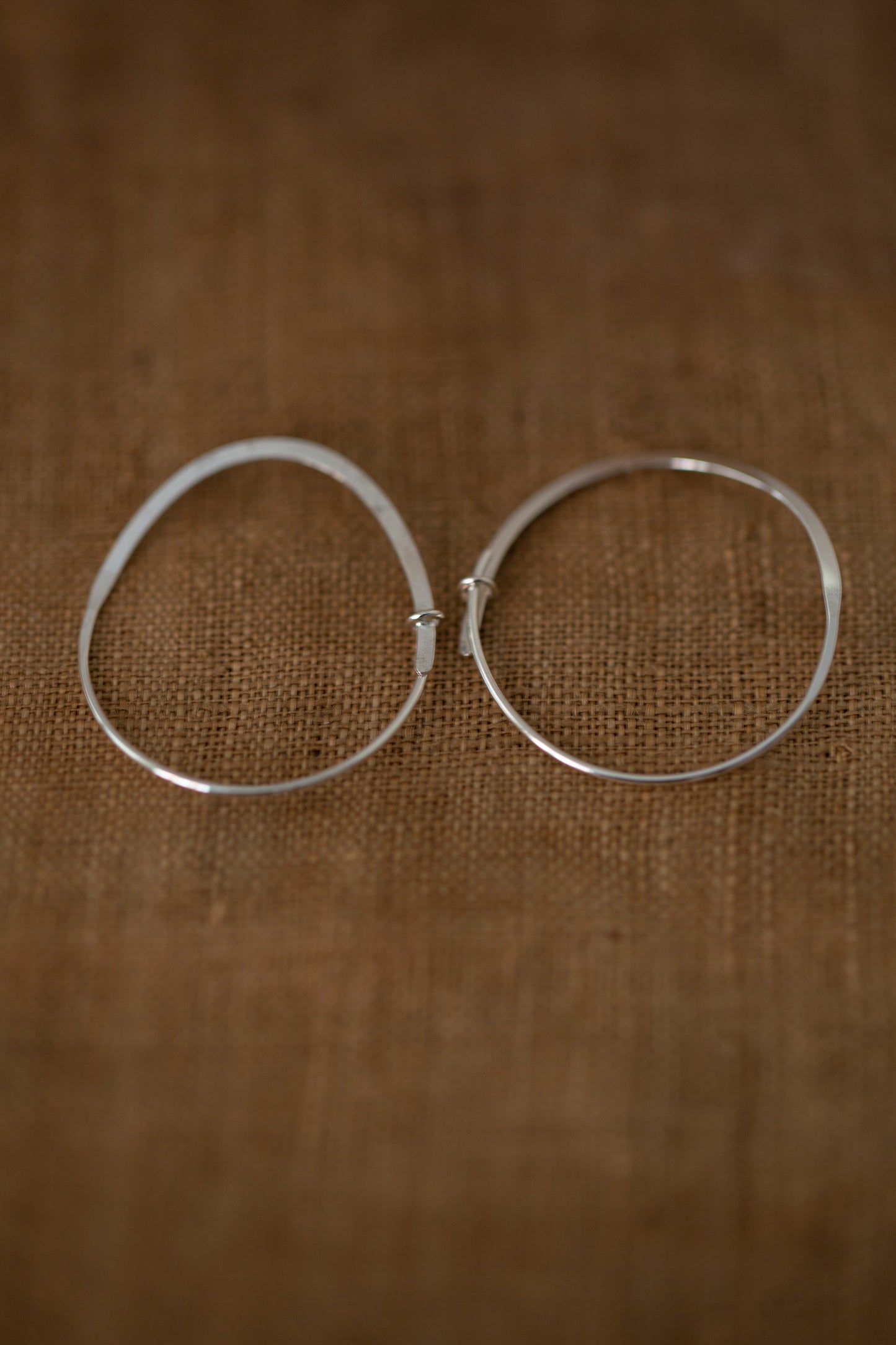 Pair Of Silver Hand Forged Earrings - medium