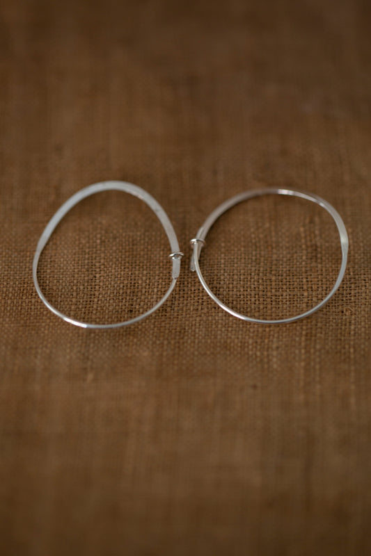 Pair Of Silver Hand Forged Earrings - medium