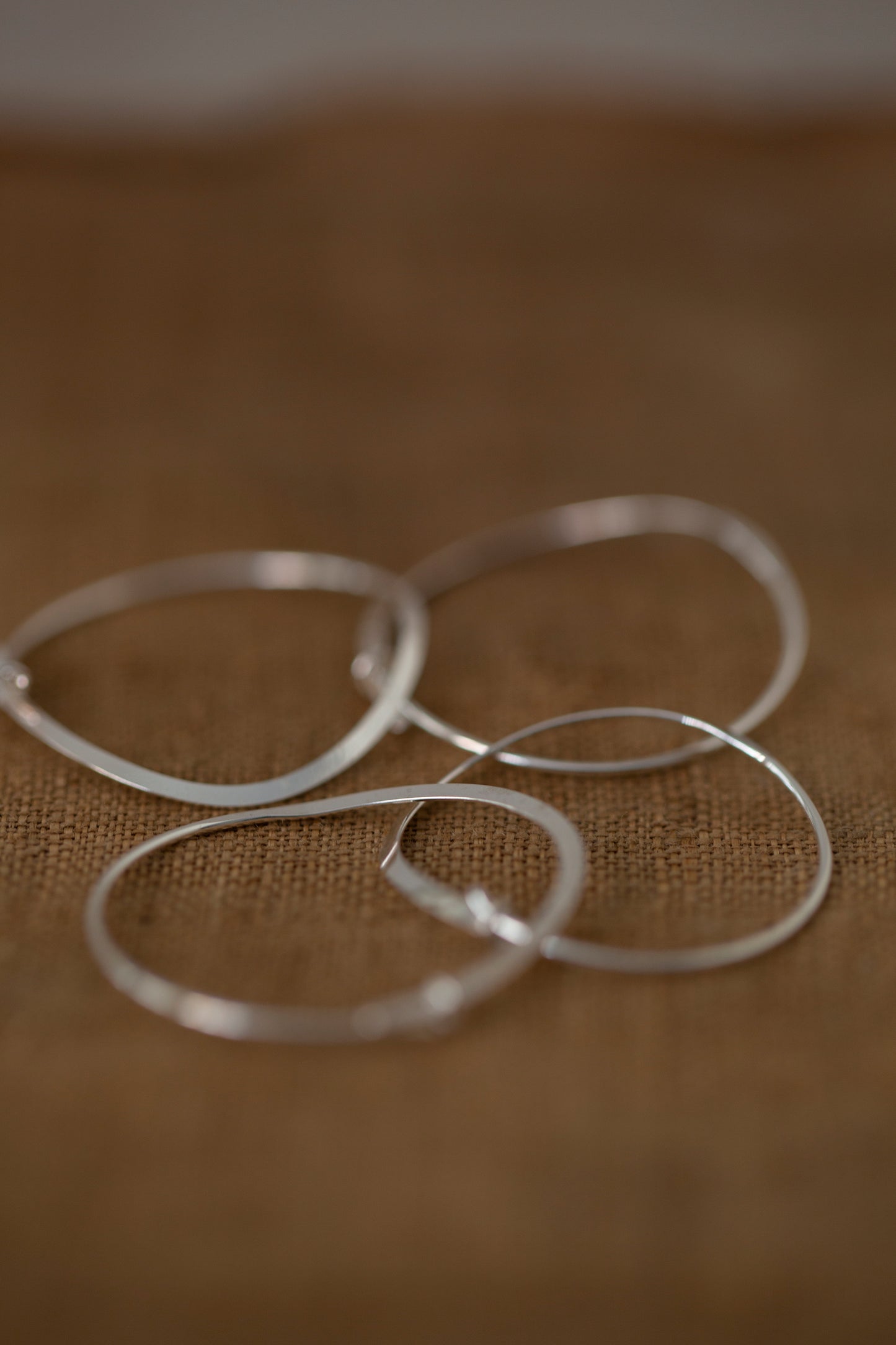 Pair Of Silver Hand Forged Earrings - medium
